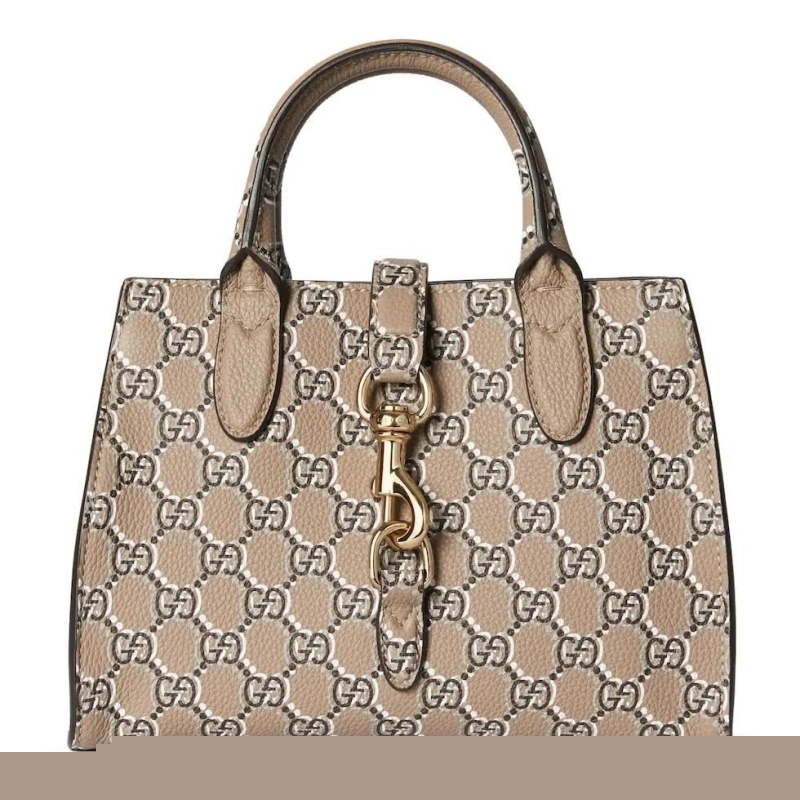 G*u*i shopping bags
